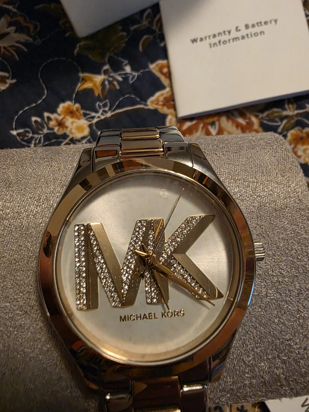 Womens Michael Kors Two Tone Gold And Silver Crystal MK Logo Watch Face.